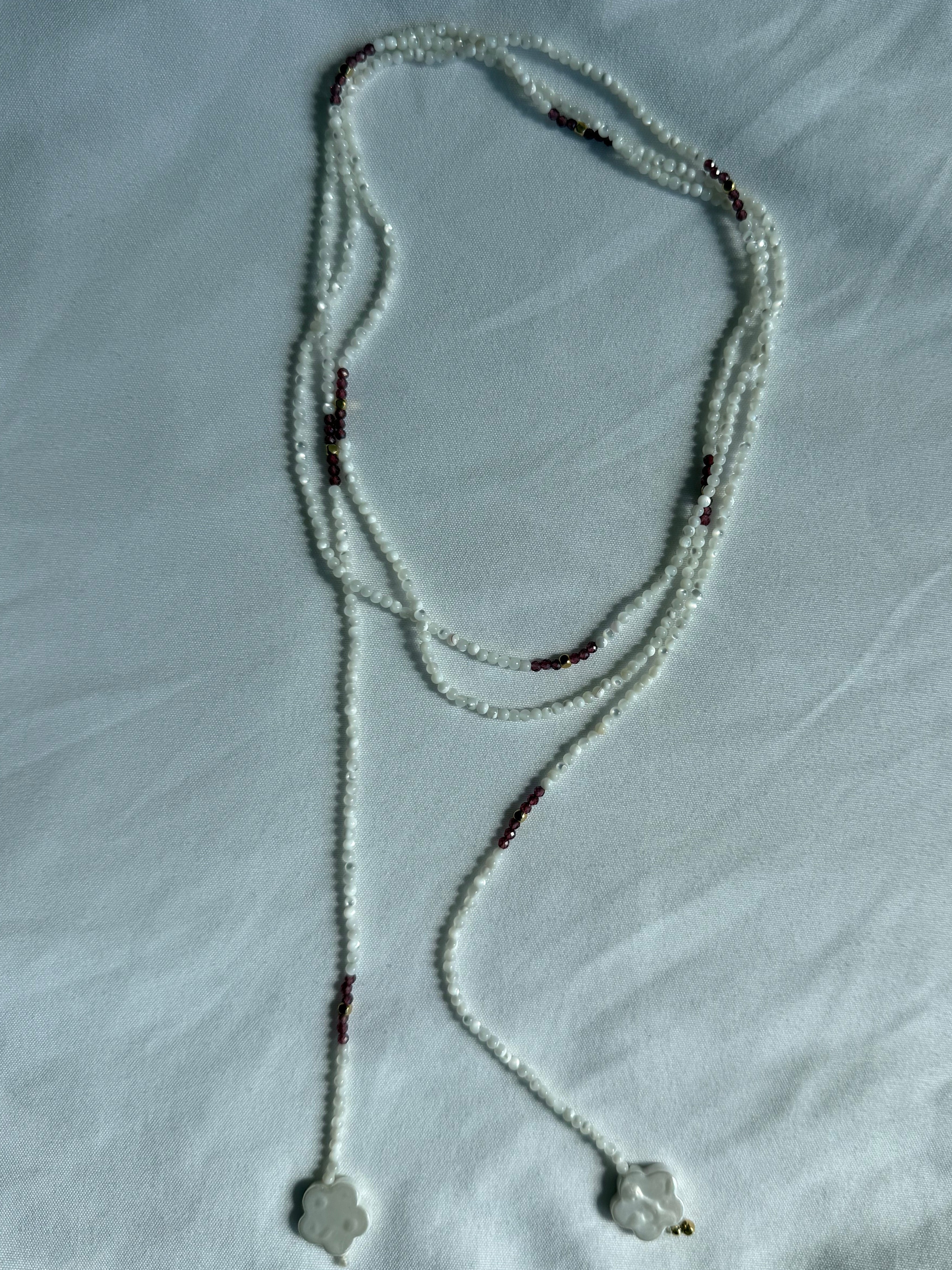 Mother of pearl, garnet and gold wrap lariat necklace