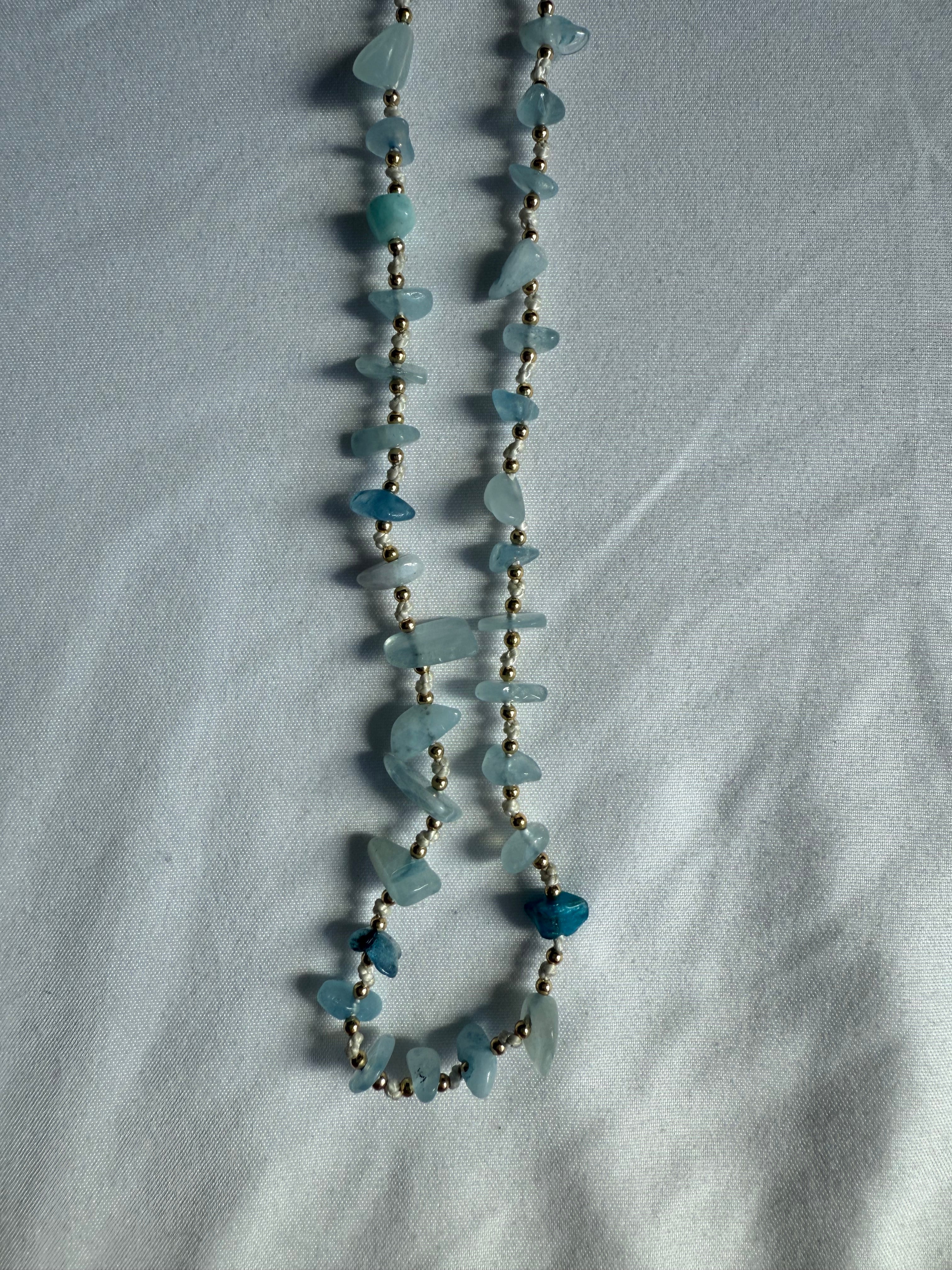 Natural blue gemstone and gold beaded necklace