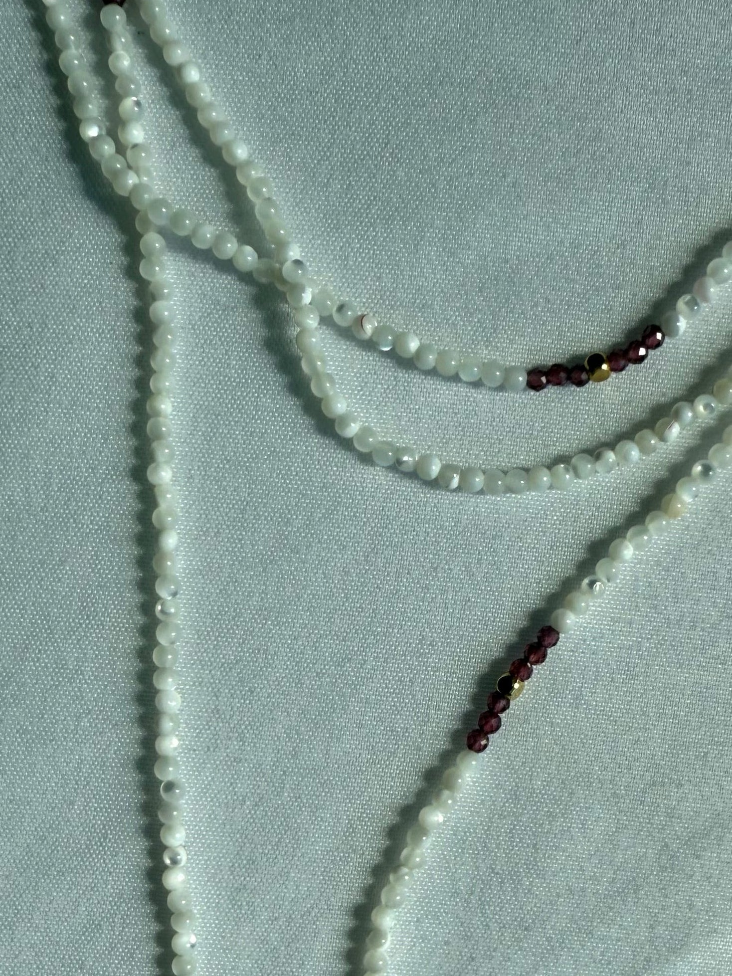 Mother of pearl, garnet and gold wrap lariat necklace