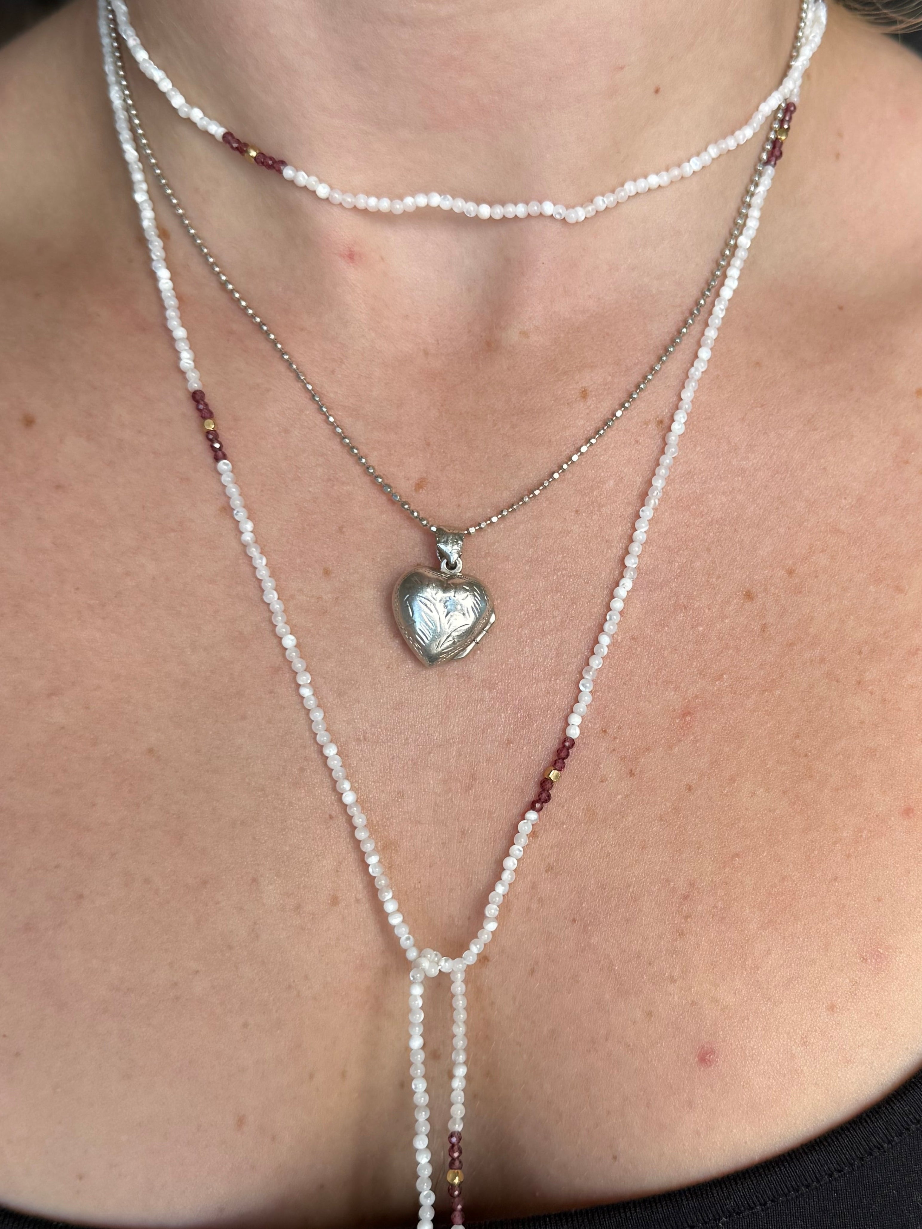 Mother of pearl, garnet and gold wrap lariat necklace