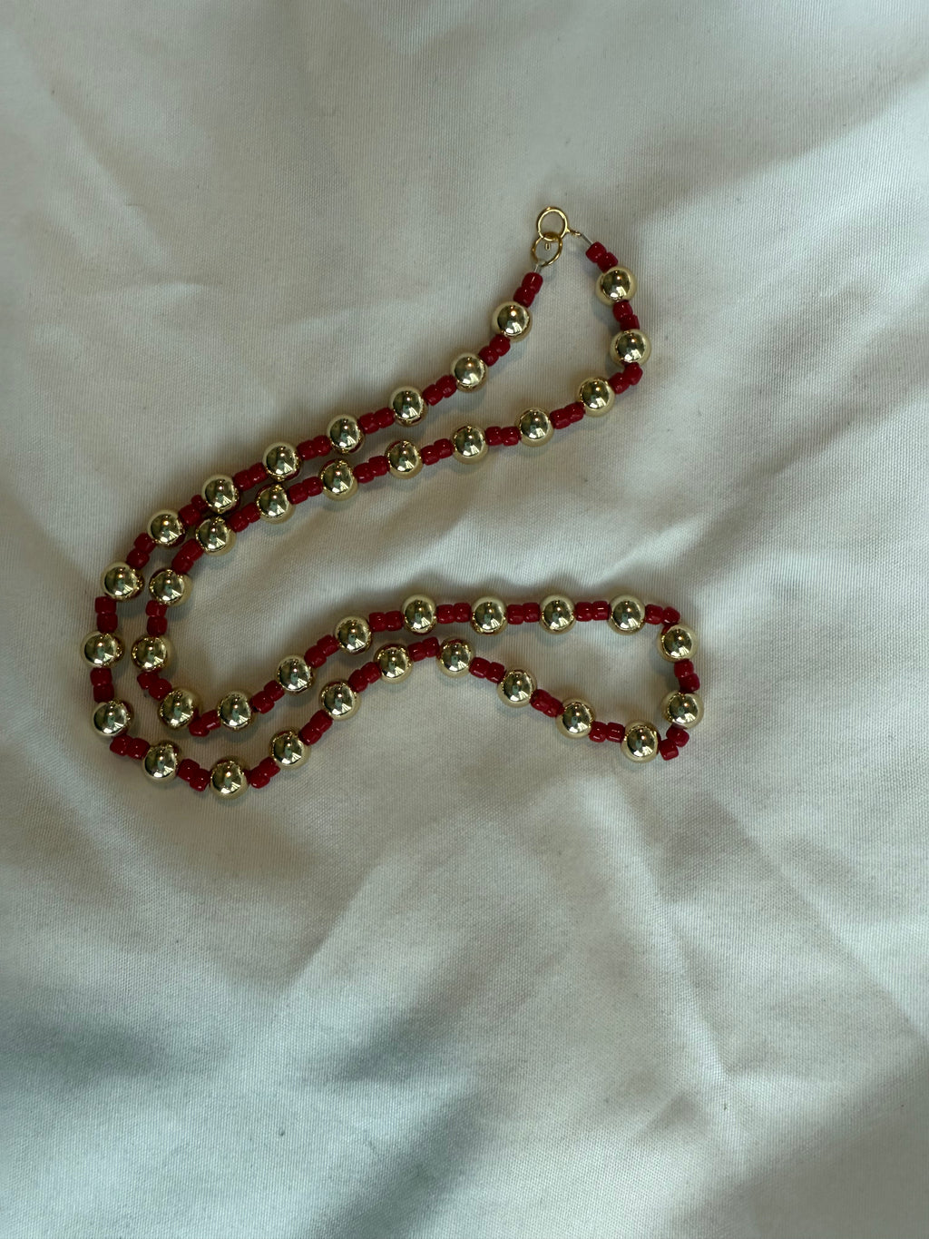 Red and gold beaded necklace