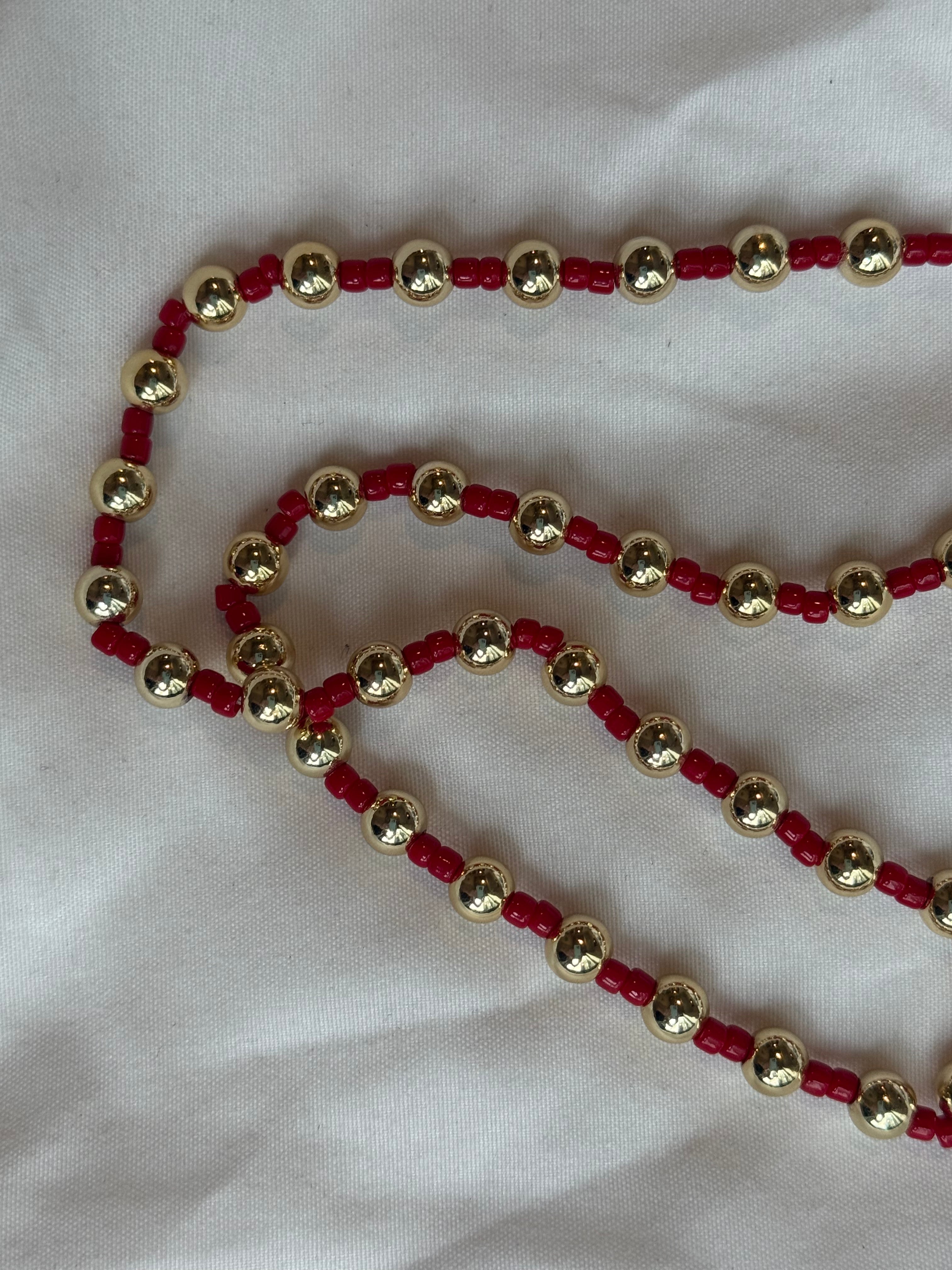 Red and gold beaded necklace